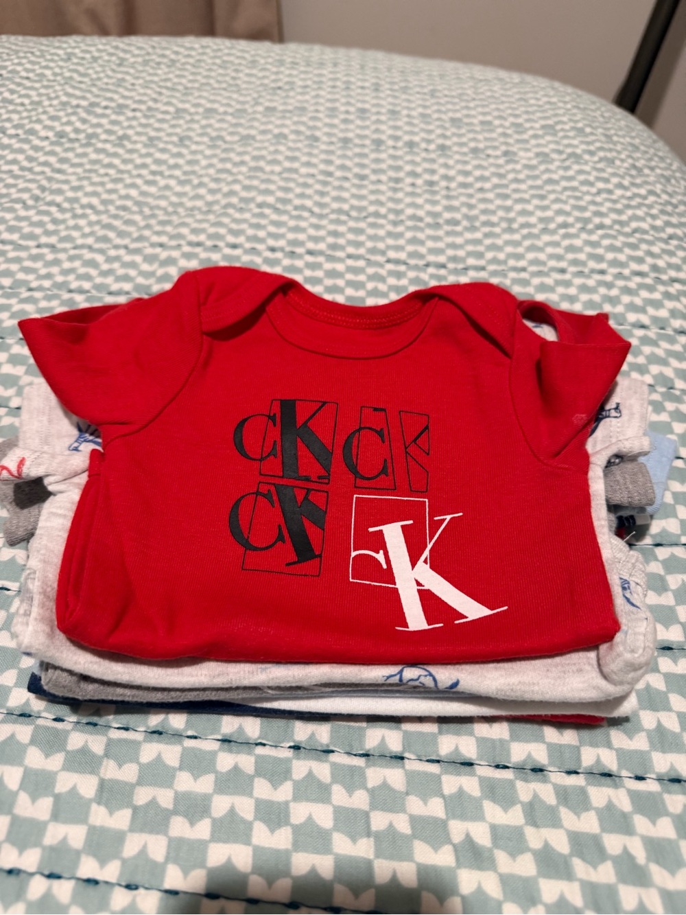 Calvin Klein and Original penguin bodysuits